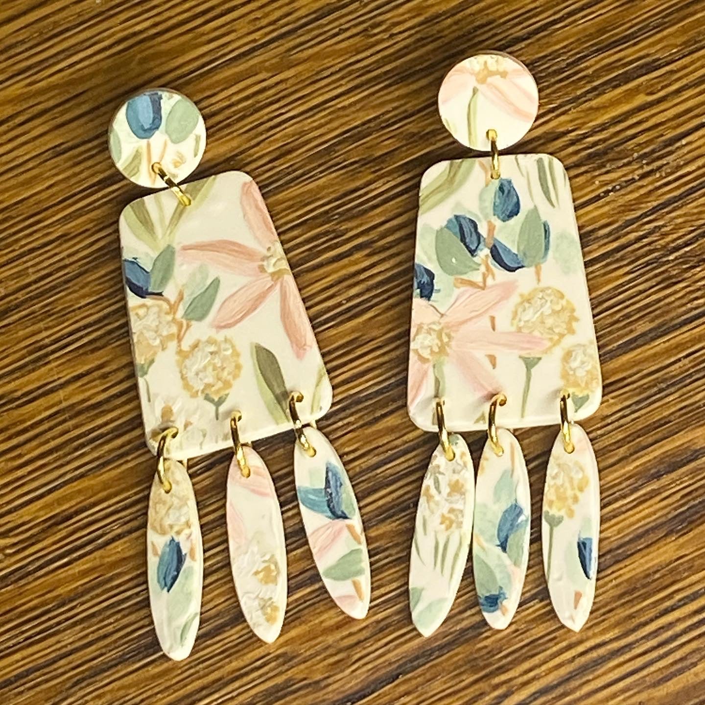 Hand-painted floral dangle earrings. 